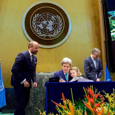 US Secretary of State John Kerry signs the COP21 UN Climate Change agreement. 